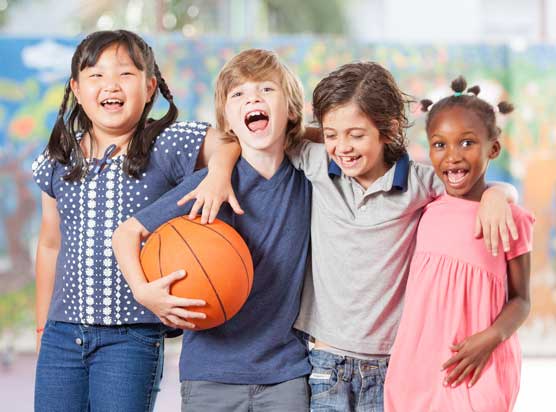 Group of kids with a basketball