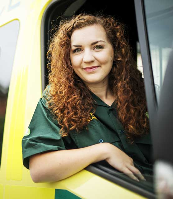 Woman driving ambulance