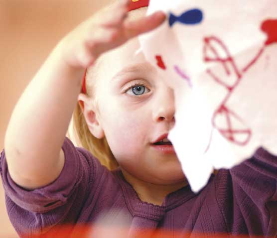 Small girl with a drawing