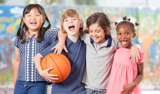 Group of kids with a basketball