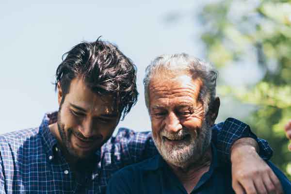 Man hugging his father