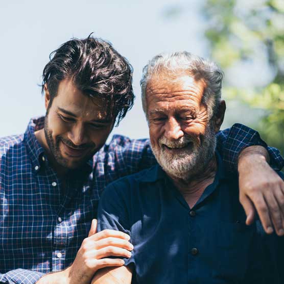 Man hugging his father