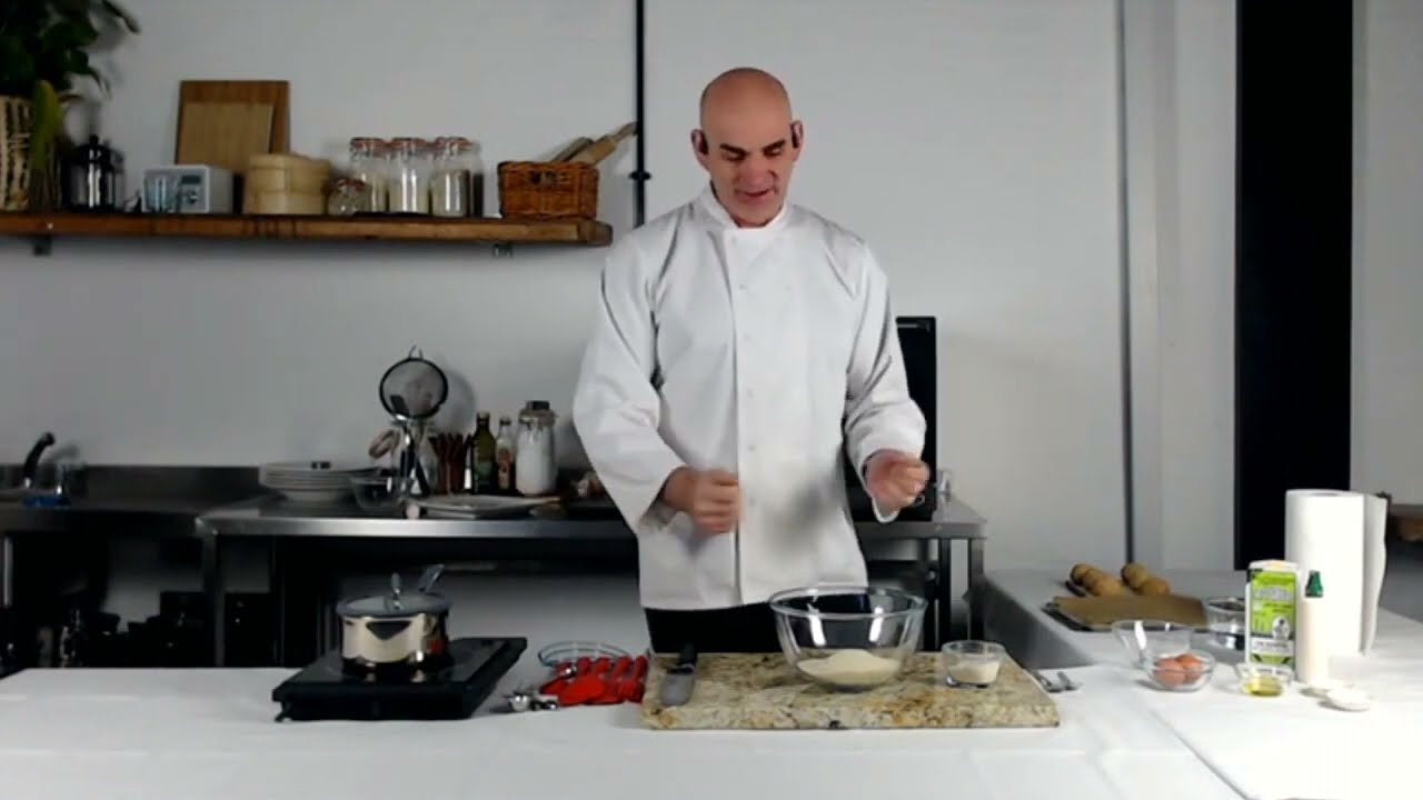 Chef Neil cooking bread rolls